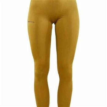 Dámske elastické nohavice CRAFT Core Essence žlté 1908772-650000