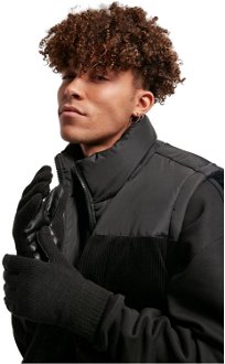 Knitted gloves made of black synthetic leather